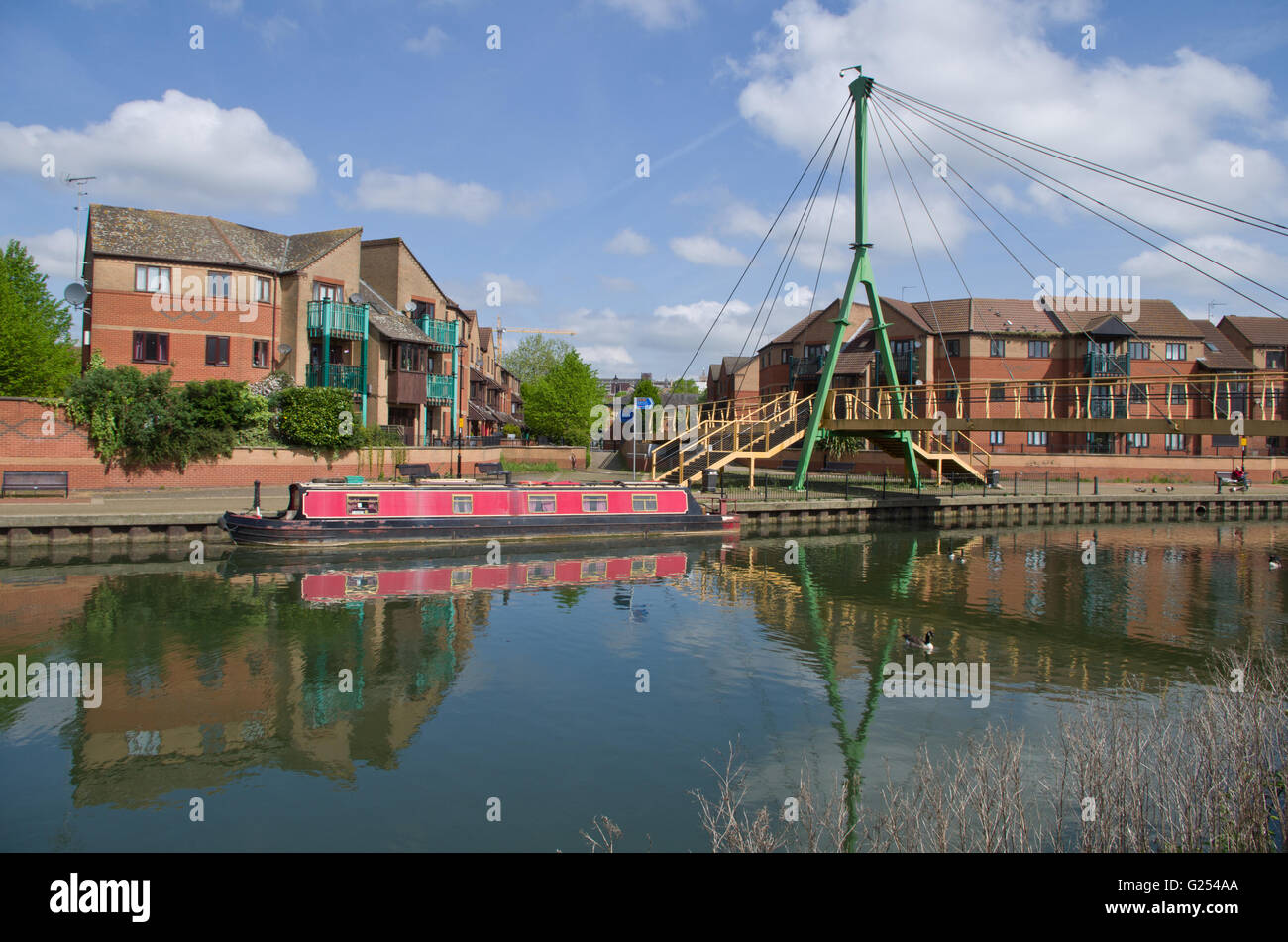 The River Nene at Southbridge Northampton, UK; with a canal boat