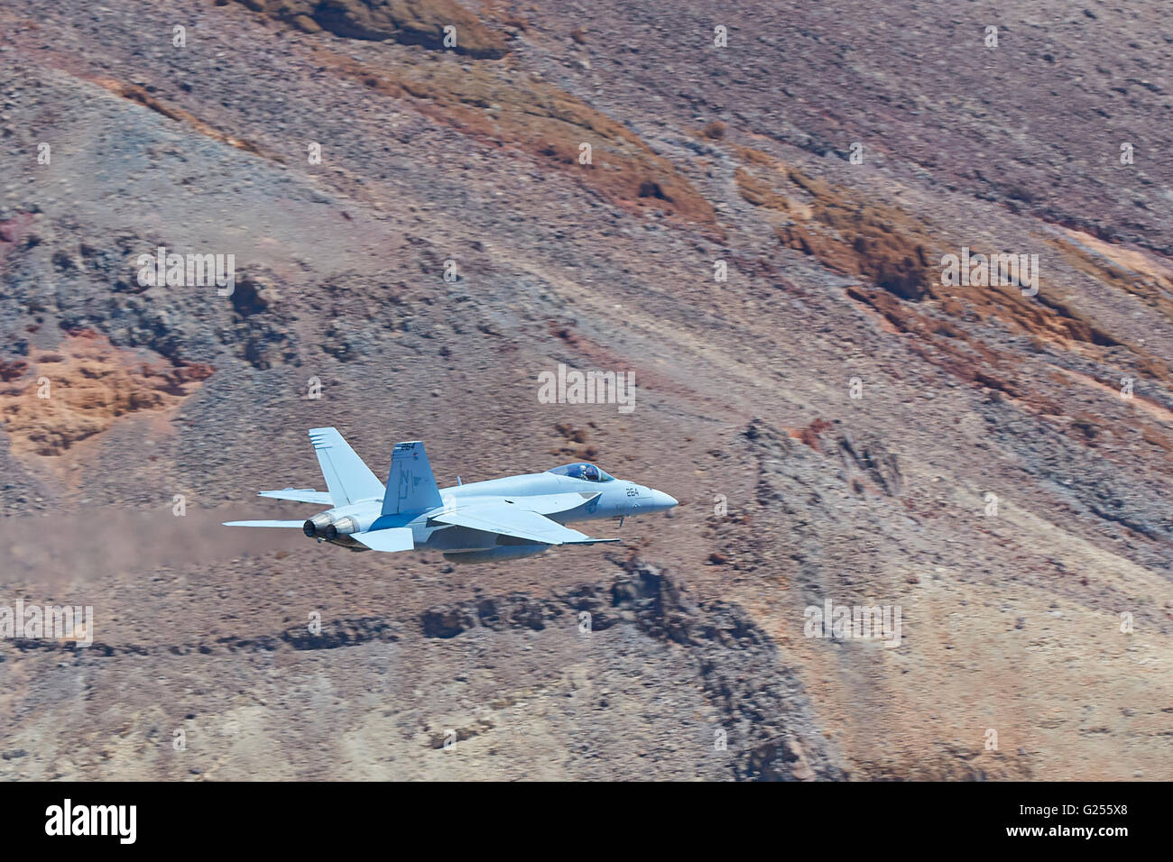 United States Navy F/A-18E Super Hornet Flying Along Rainbow Canyon (Star Wars Canyon), California, USA. Stock Photo