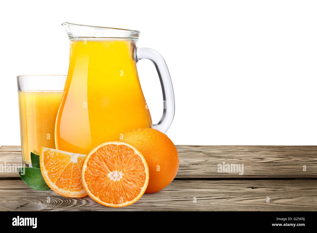 https://c8.alamy.com/comp/G2569J/jug-or-pitcher-of-orange-juice-with-oranges-on-wooden-table-clipping-G2569J.jpg