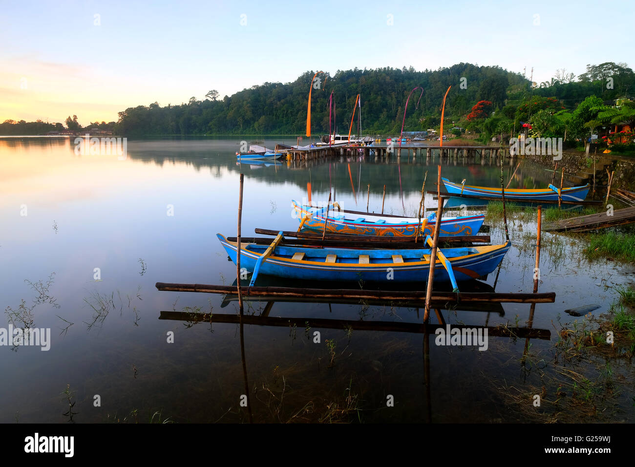 Fishing Boats anchored at Pura Ulun Danu, Bali, Indonesia Stock Photo