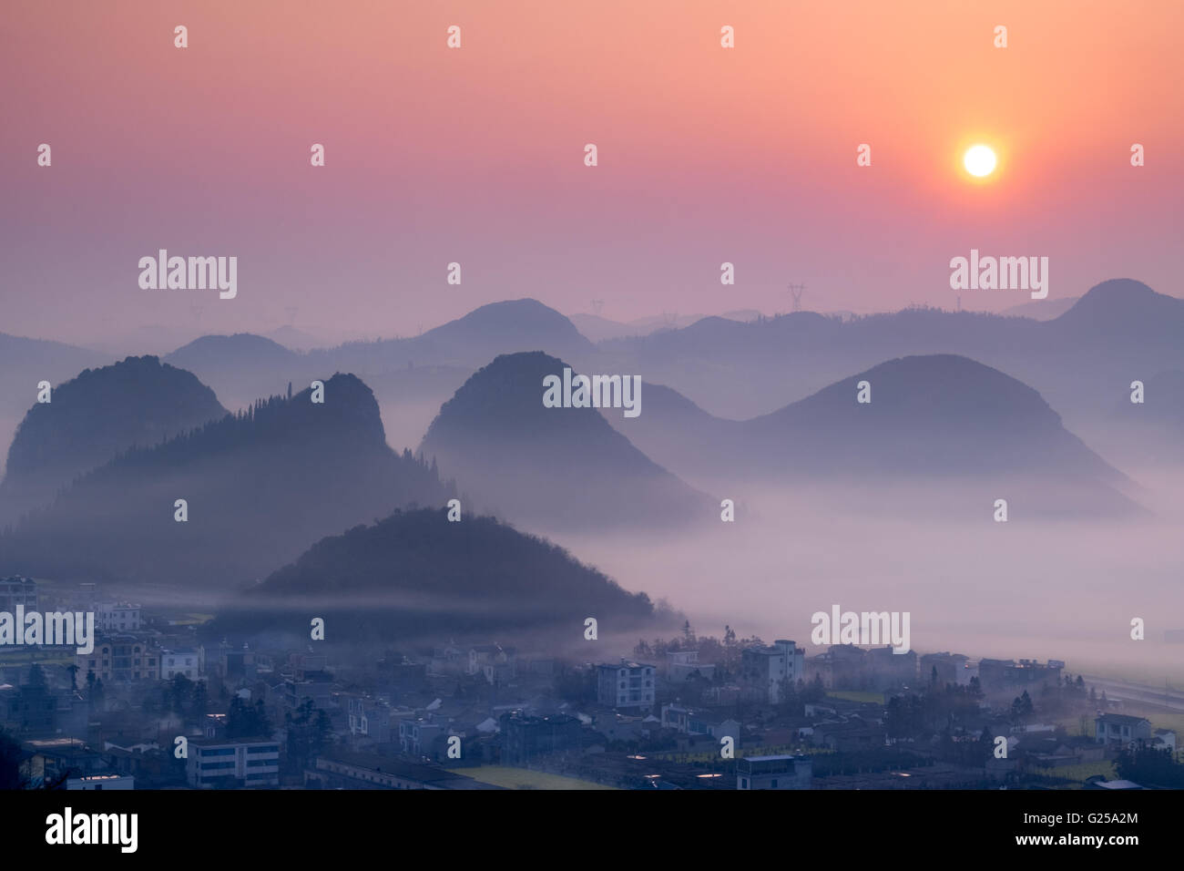 Mist over luoping, qujing, Yunnan, China Stock Photo