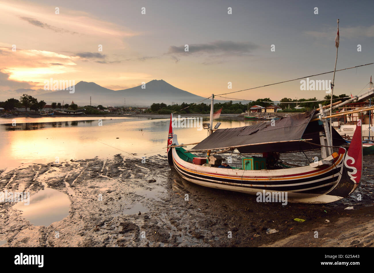 Boat anchored on beach, Pantai Boom, East Java, Indonesia Stock Photo