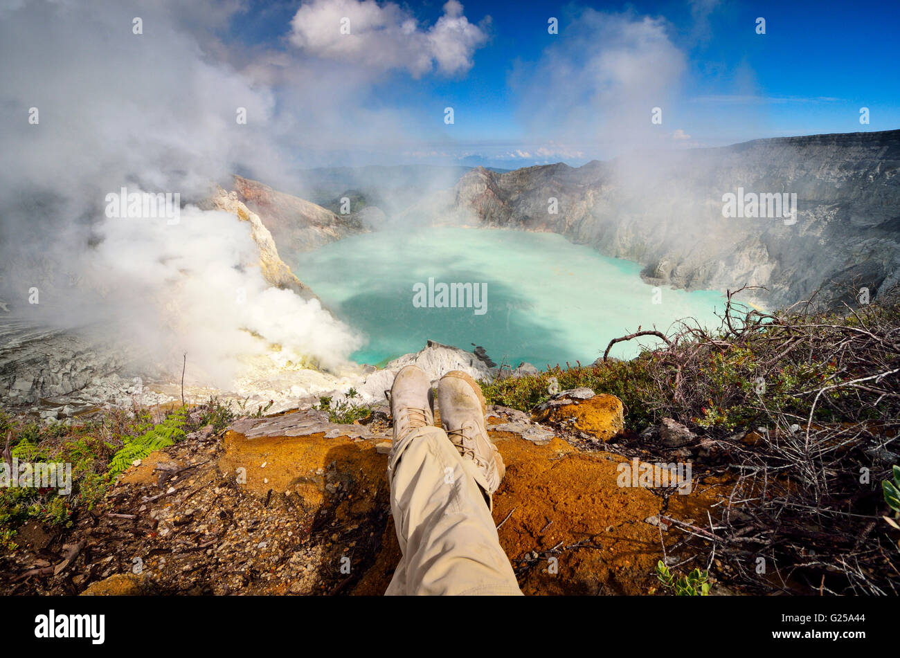 Man looking at view, Ljen volcano, East Java, Indonesia Stock Photo