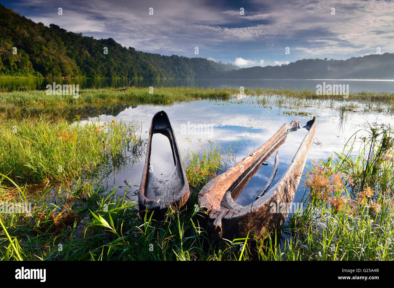 Wooden boats on lake, Andau Tamblingan, Denpasar, Bali, Indonesia Stock Photo