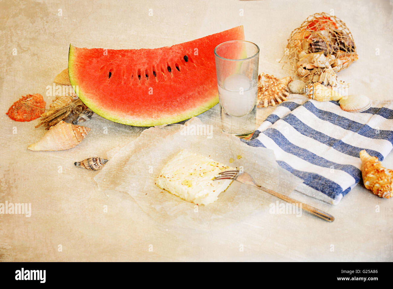 Watermelon slice, feta cheese and ouzo Stock Photo