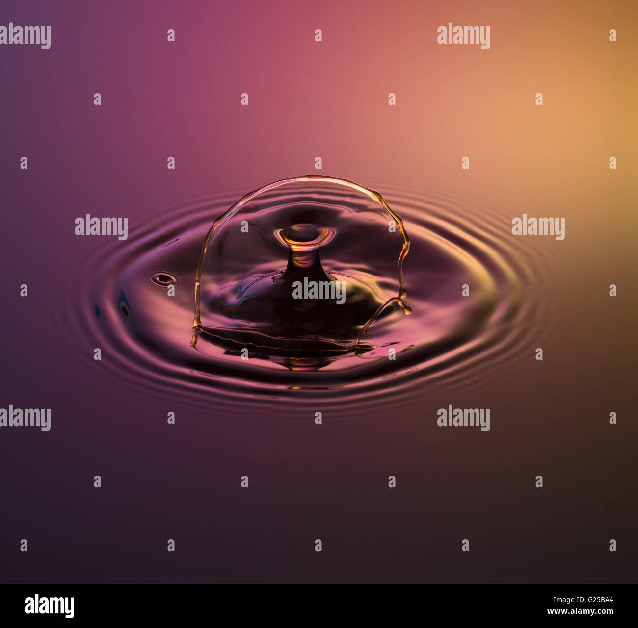 Water drop photography, one or two drops of water dropped from height into water and captured as