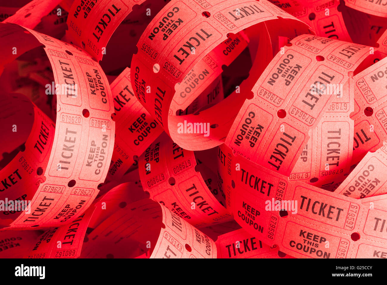 Unwound Messy Roll of Red Tickets Piled Up. Stock Photo