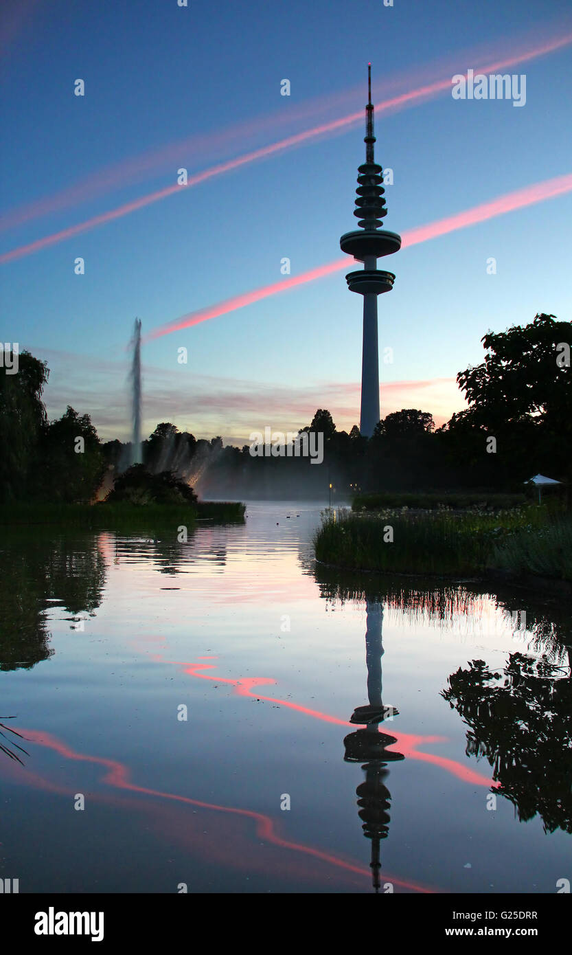 TV Tower (Heinrich-Hertz-Turm) reflected in the lake of Planten un Blomen park in Hamburg, Germany Stock Photo