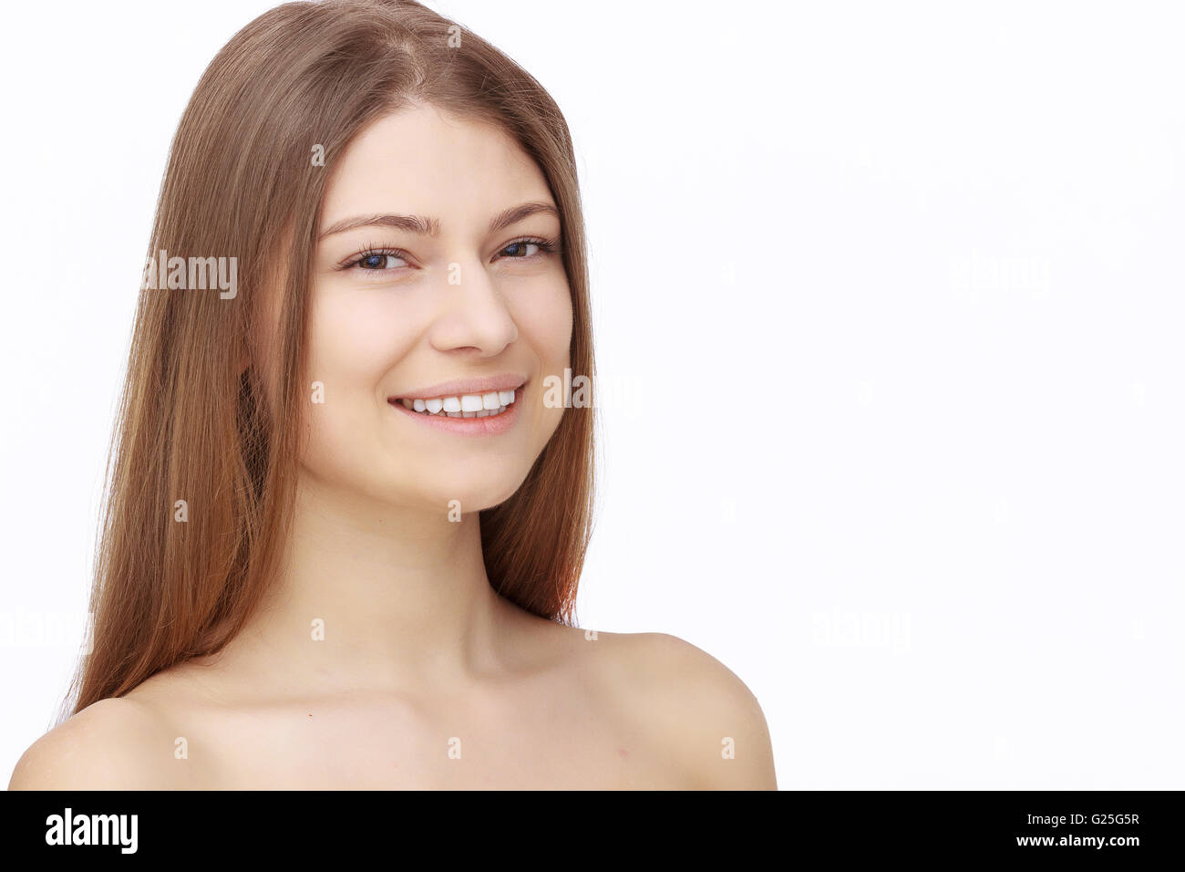 Happy young woman isolated on white background Stock Photo - Alamy
