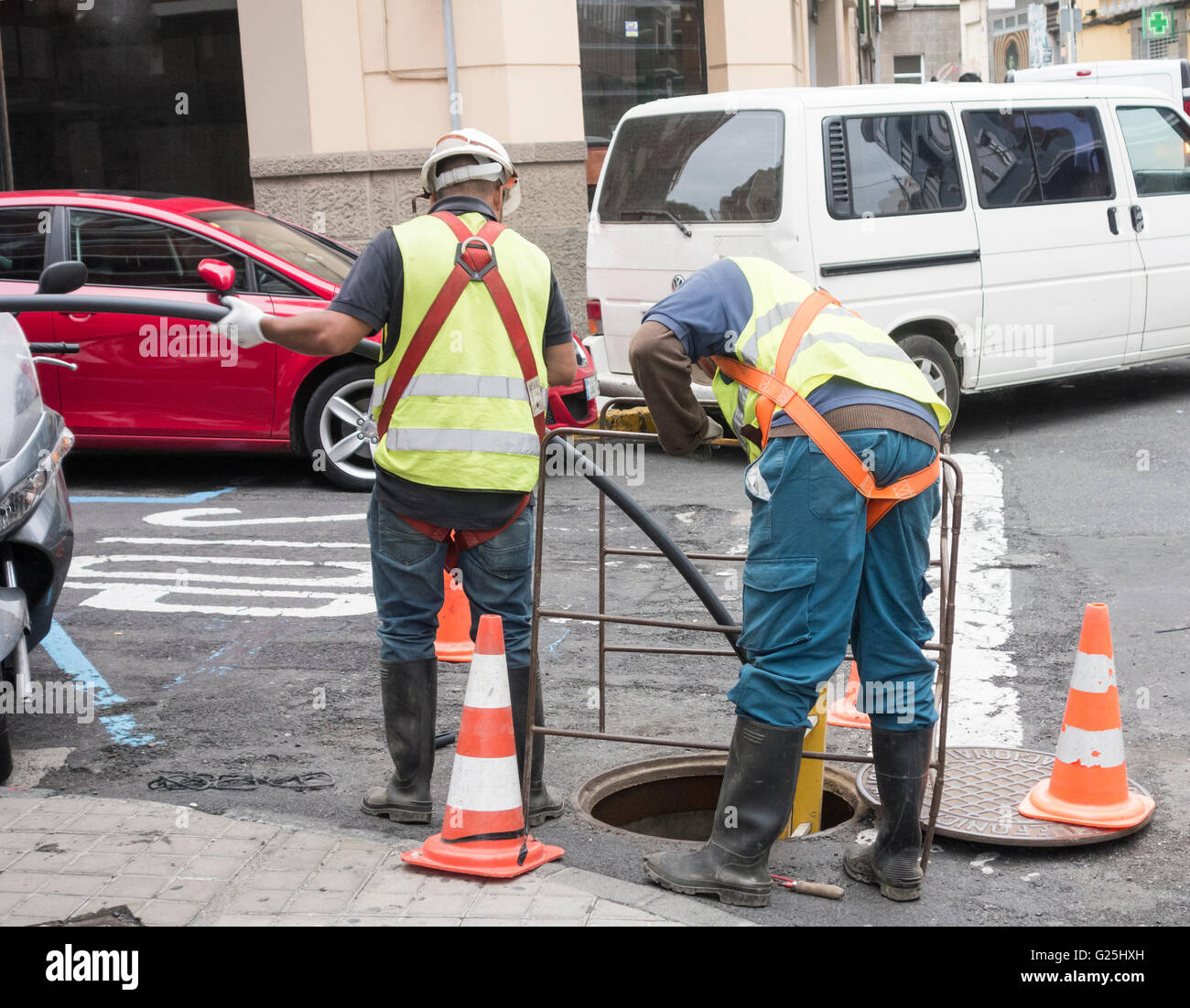 Telephone engineer installing fibre optic cables in Las Palmas, Canary Islands, Spain Stock Photo