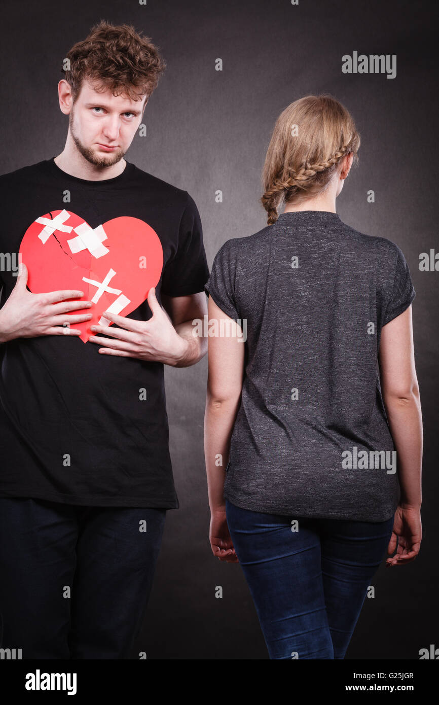 Broken heart difficult love concept. Sad unhappy couple woman and man ...