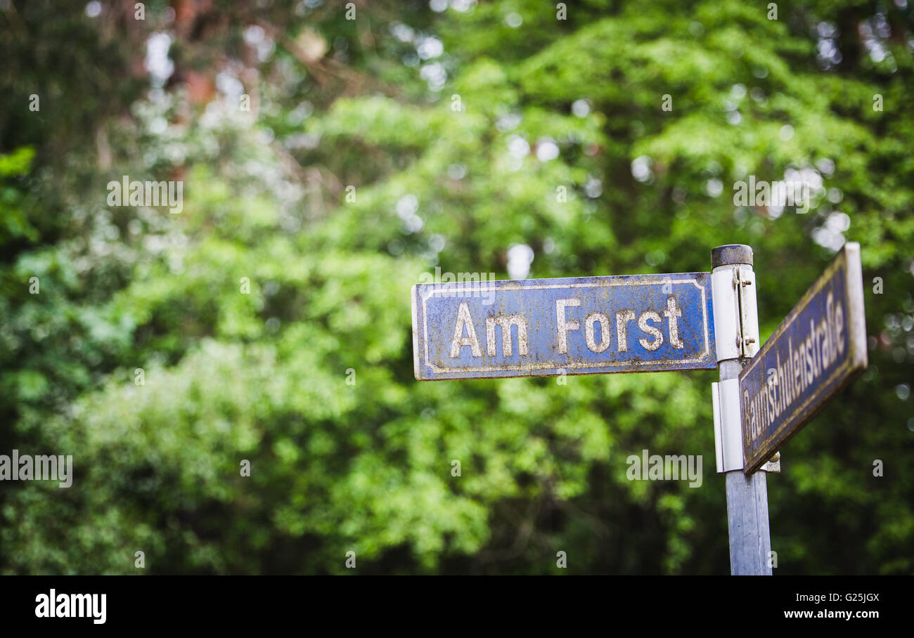 street road sign indicating label german Am Forst Stock Photo