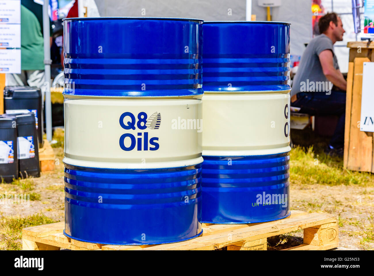 Emmaboda, Sweden - May 13, 2016: Forest and tractor (Skog och traktor) fair. Two blue barrels of Q8 oil on pallets. Stock Photo