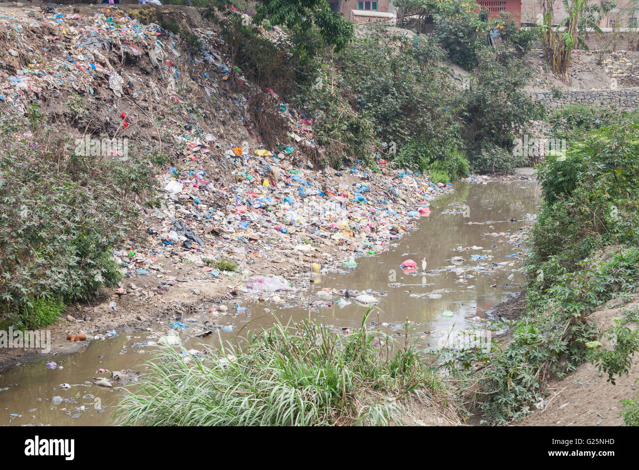 Rubbish dump along a river, Bhaktapur, Nepal Stock Photo