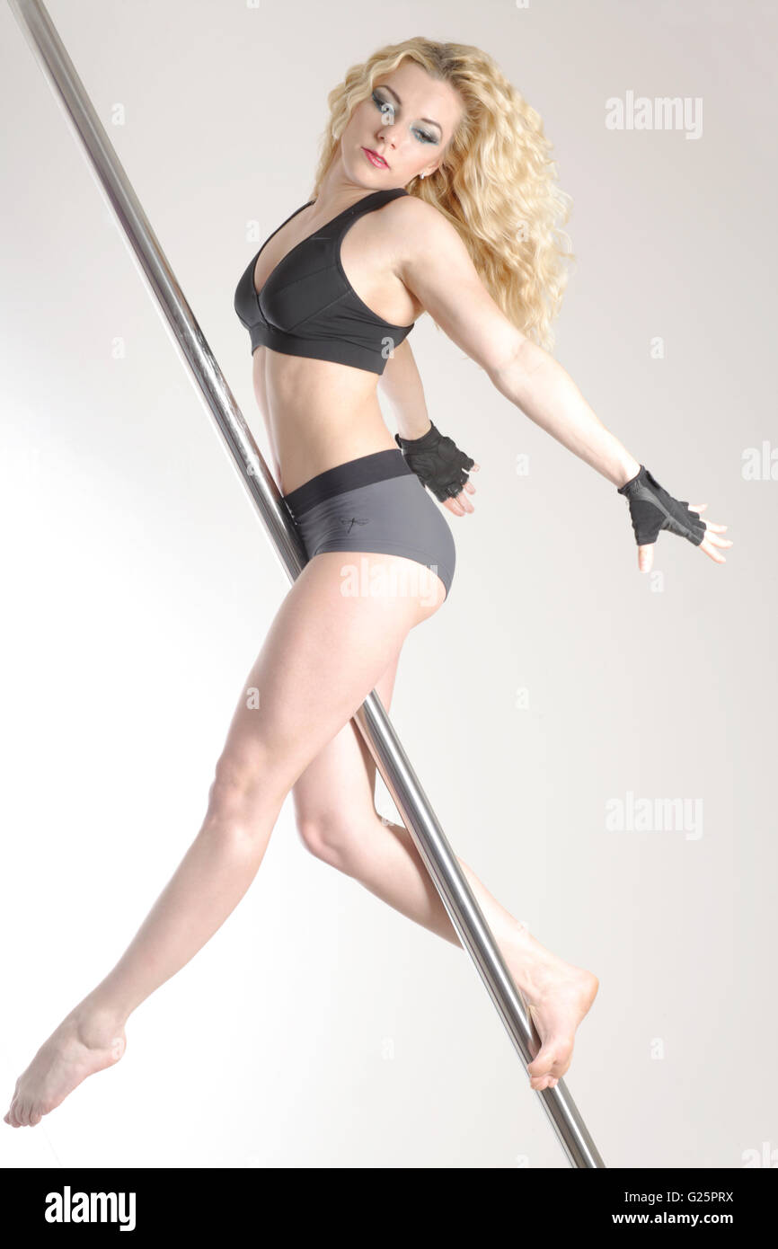 Woman, 24 years, pole dancing Stock Photo