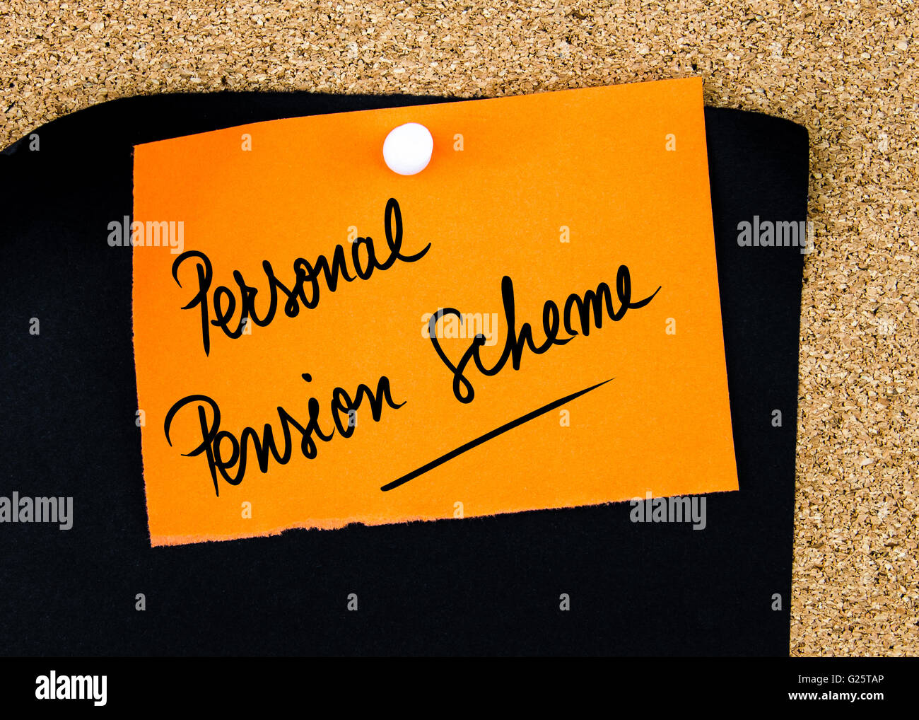 Personal Pension Scheme written on orange paper note pinned on cork board with white thumbtacks, copy space available Stock Photo