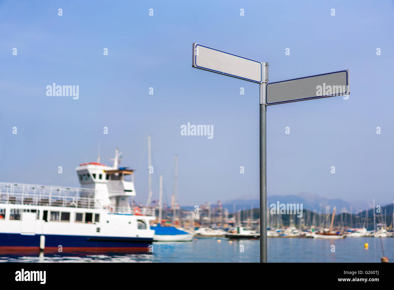 Blank signpost with clipping path at public marina bay Stock Photo