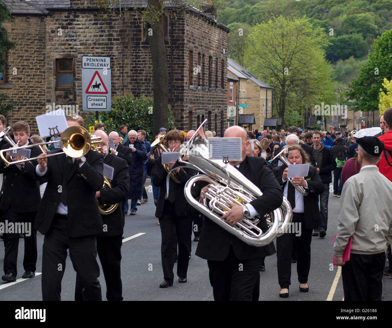 Brass band players march through Greenfield during the annual