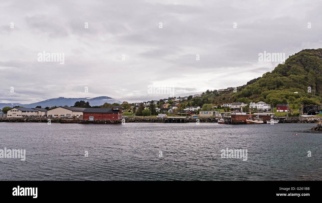 Valkvæ, Godøya, Sunnmøre, Norway a fishing community to the north of Ålesund. Gjøtetunnelen  far right. Stock Photo