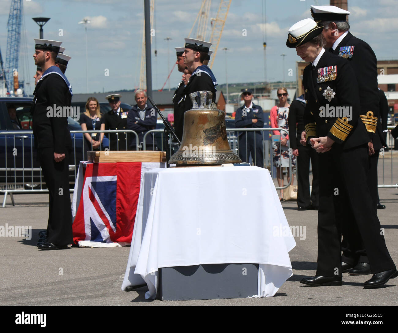 Portsmouth, Hampshire, UK. 24th May, 2016. A restored bell from a WW2 Battlecruiser has been unveiled by Princess Anne today. The bell from HMS Hood is now on display at the National Museum of the Royal Navy (NMRN) at Portsmouth Historic Dockyard after being recovered from the seabed last year. HMS Hood was hit by a shell by German battleship, Bismarck, in 1941 and today marks the 75th anniversary of that day. Princess Anne then went on to officially open the NMRN's new exhibition telling the story of the Battle of Jutland Credit:  uknip/Alamy Live News Stock Photo