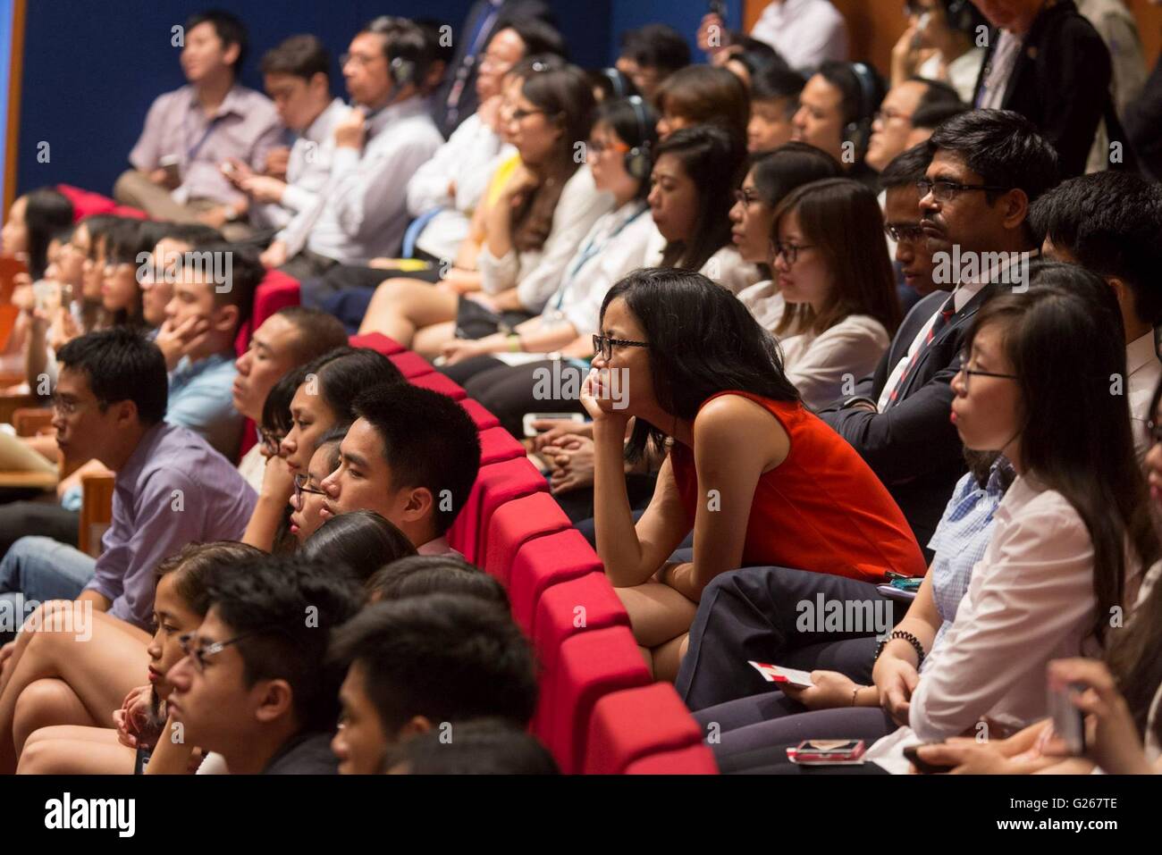 Ho Chi Minh City, Vietnam. 24th May, 2016. Vietnamese listen to an address by U.S President Barack Obama at the National Convention Center May 24, 2016 in Hanoi, Vietnam Credit:  Planetpix/Alamy Live News Stock Photo