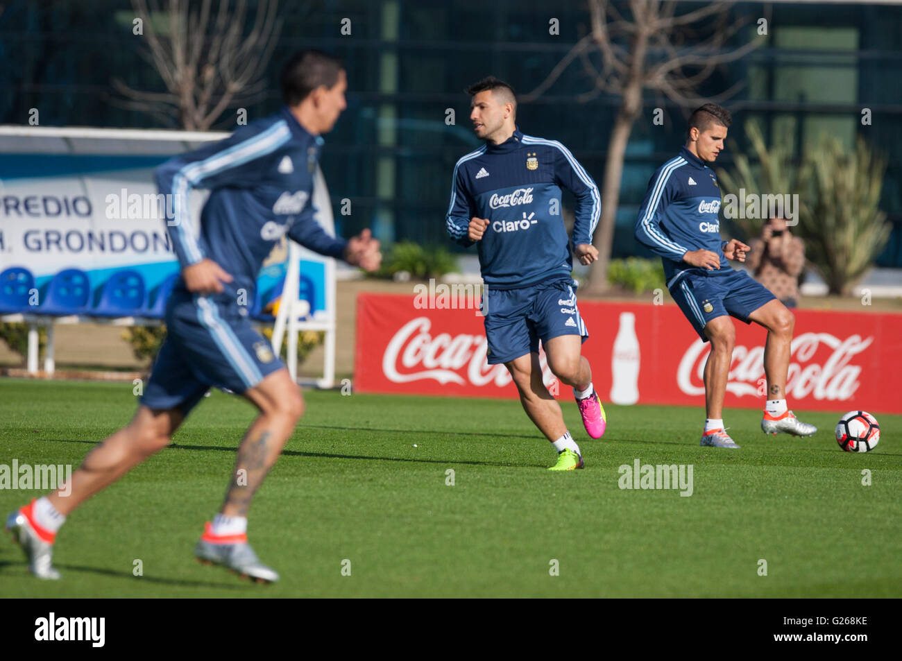 Ezeiza, Argentina. 24th May, 2016. Angel Di Maria (L), Sergio Aguero (C)and Erik Lamela (R), players of Argentina national soccer team, participate in a training session in the complex of the Argentina football Association (AFA), Ezeiza city, 32 km from Buenos Aires, capital of Argentina, on May 24, 2016. Argentina soccer team conducted their training before the friendly match against Honduras to be held on May 27. © Martin Zabala/Xinhua/Alamy Live News Stock Photo
