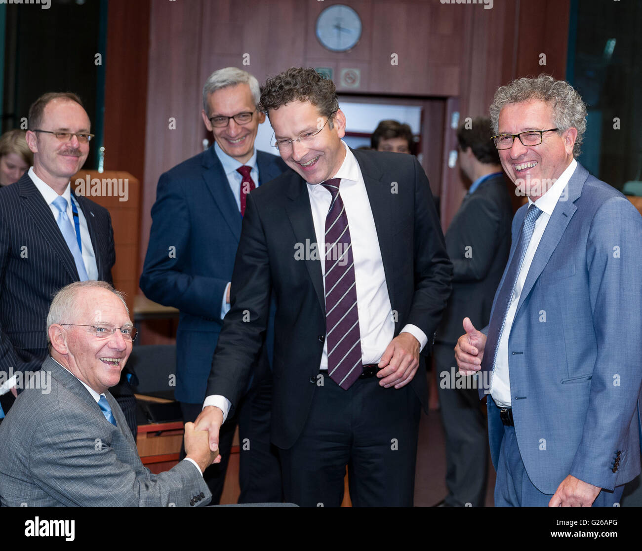 Brussels, Belgium. 24th May, 2016. From Left: German Finance Minister Wolfgang Schaeuble is talking with the Dutch Minister of Finance, President of the Council Jeroen Dijsselbloem and the Luxembourg Minister of Finance, Treasury, & Budget Pierre Gramegna prior the start of an · group Ministers meeting in the EU Council HQ. Credit:  dpa picture alliance/Alamy Live News Stock Photo