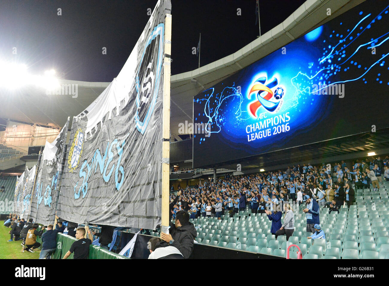 Allianz Stadium, Sydney, Australia. 25th May, 2016. AFC Champions League. Round of 16 game 2. Sydney v Shandong Luneng. Sydney fans unfurl their tifo before the game. Credit:  Action Plus Sports/Alamy Live News Stock Photo