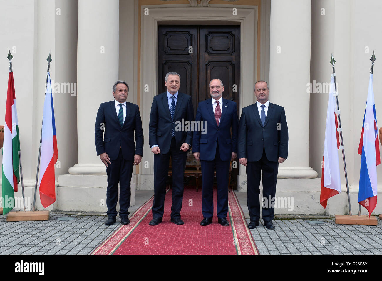Liblice, Czech Republic. 25th May, 2016. From left to right, Hungarian Defense Minister Tomas Vargha, Czech Defense Minister Martin Stropnicky, Polish Defense Minister Antoni Macierewicz and Slovak Defense Minister Peter Gajdos pose for photo during a meeting of defense ministers of the Visegrad Group at the chateau in Liblice, Czech Republic, May 25, 2016. Credit:  Katerina Sulova/CTK Photo/Alamy Live News Stock Photo