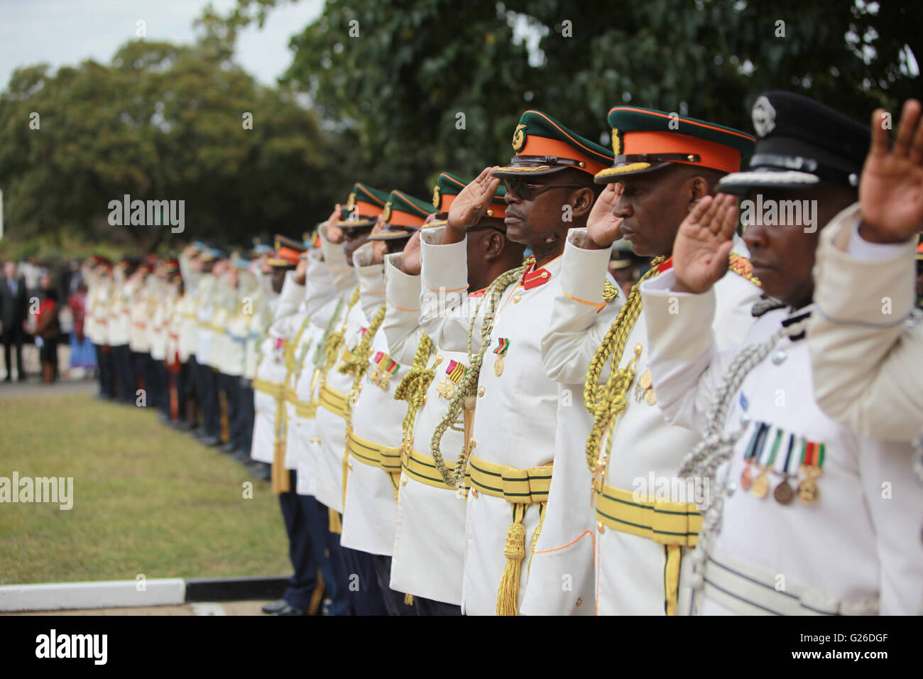 Lusaka, Zambia. 25th May, 2016. Officers and soldiers salute at the Freedom Statue during a wreath-laying ceremony in honor of fallen freedom fighters in Lusaka, capital of Zambia, May 25, 2016. Zambia commemorated the Africa Freedom Day in colorful celebrations. © Peng Lijun/Xinhua/Alamy Live News Stock Photo