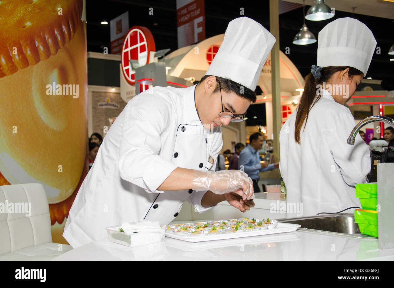 Nonthaburi, Thailand. 25th May, 2016. Chefs are cooking demonstrations to visitors in during exhibition of THAIFEX - World of food ASIA 2016 on May 25, 2016 in Nonthaburi, Thailand. Credit:  Chatchai Somwat/Alamy Live News Stock Photo