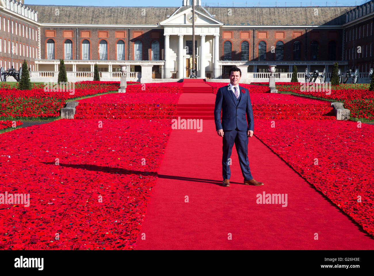 Phillip Johnson stands at the 5000 Poppies creation which he designed at the RHS Chelsea Flower Show 2016 Stock Photo
