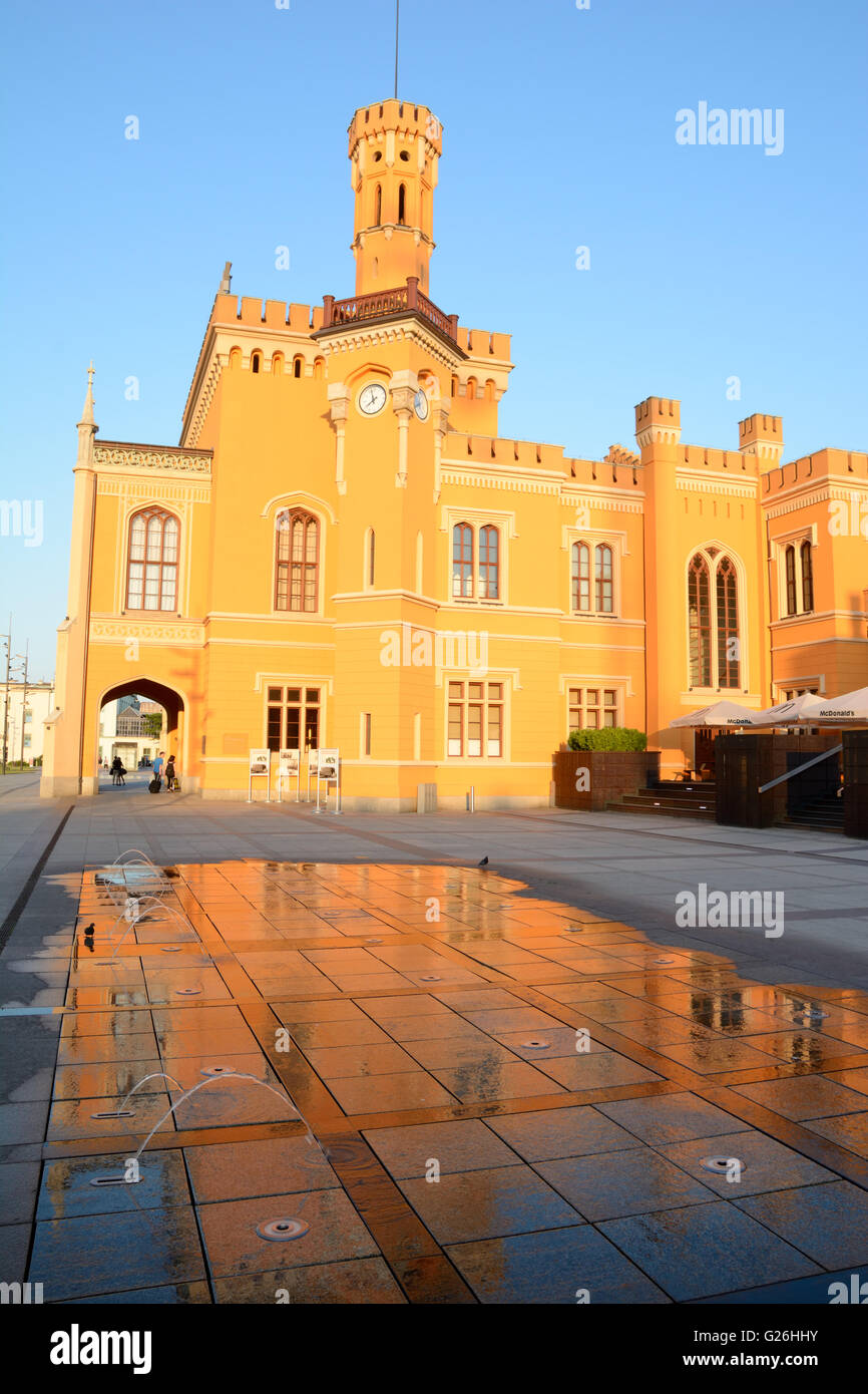 Wroclaw, Poland - June 6, 2015: Main railway station building and small fountain at sunset in Wroclaw in Poland. Stock Photo