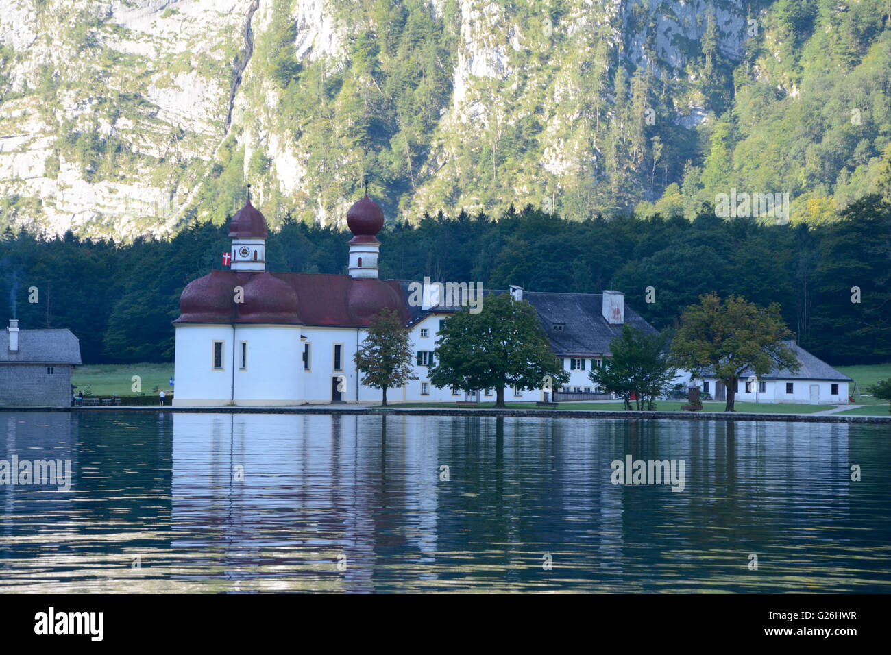 Schonau am Konigssee, Germany - August 30, 2015: Early morning at St. Bartholoma church at Koenigssee lake nearby Schonau am Kon Stock Photo