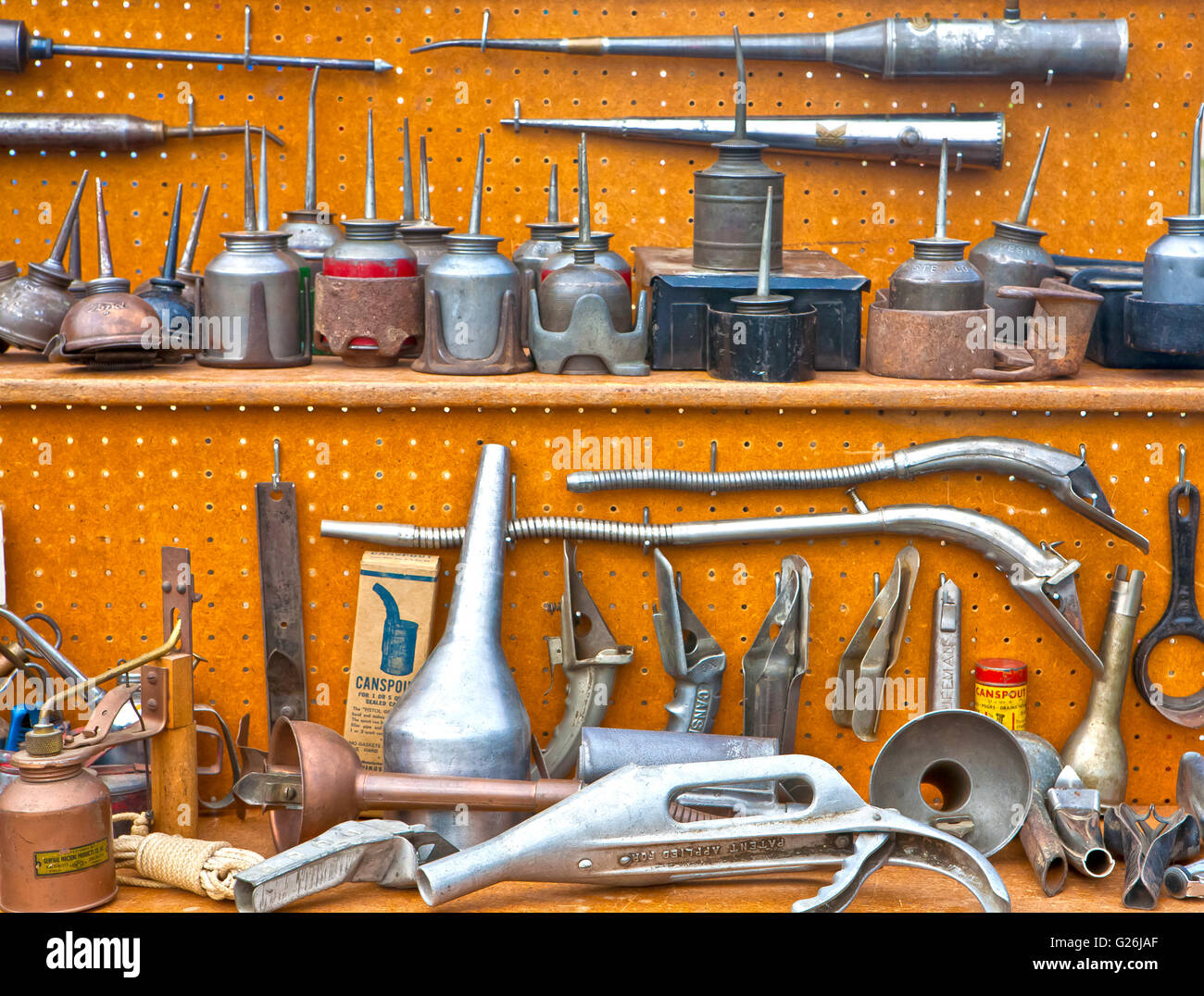 variety of antique motor oil containers and applicators Stock Photo Alamy