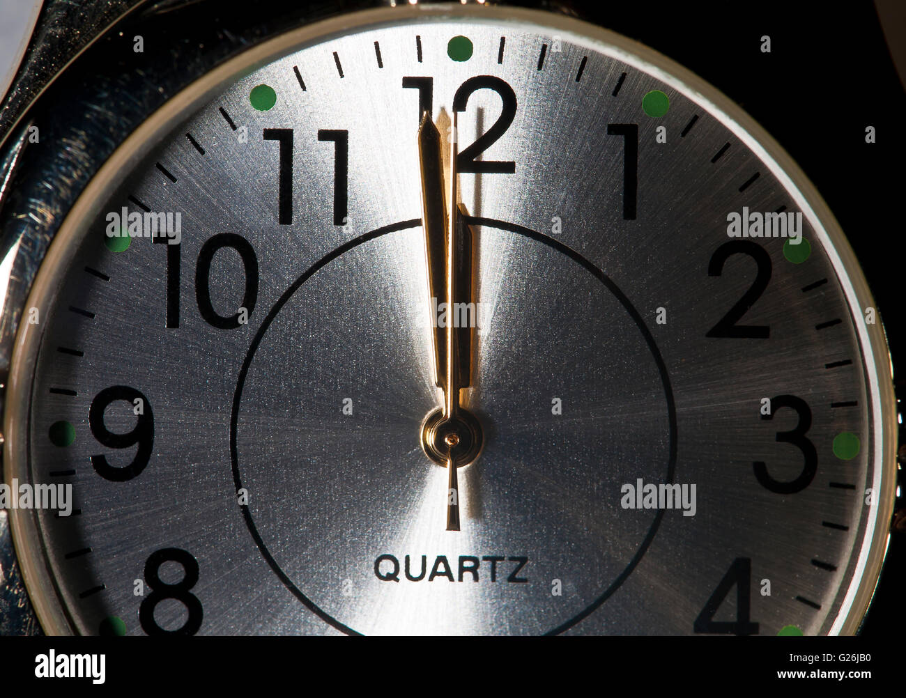 one minute to midnight clock watch face Stock Photo Alamy