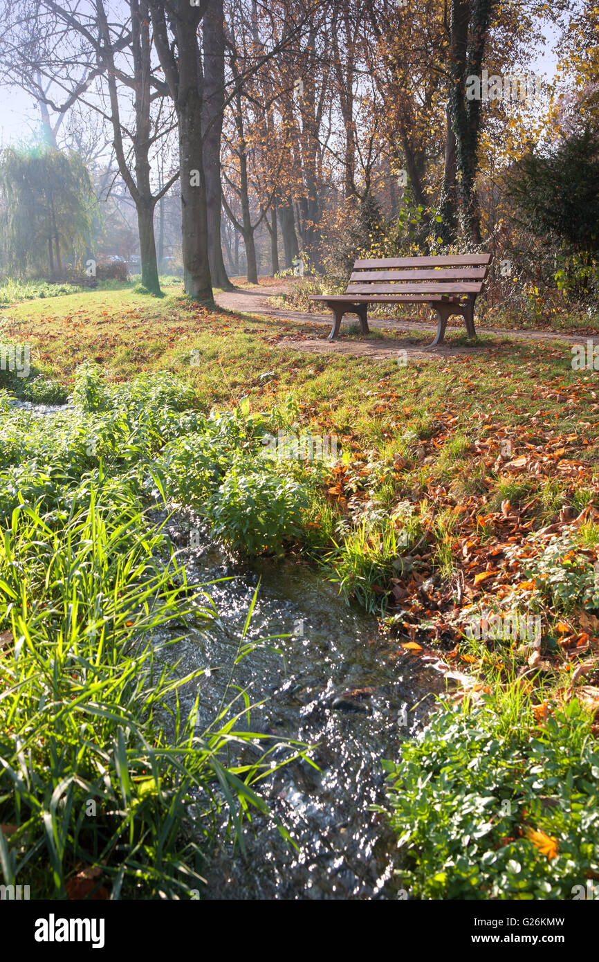 Lonely park bench overlooking hi-res stock photography and images - Alamy
