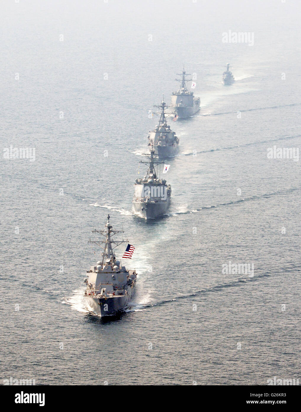 The U.S. Navy and South Korean navy ships in formation during a joint exercise May 21, 2016 in the Yellow Sea. Ships from front to back are: U.S Navy guided-missile destroyer USS Momsen, South Korean Navy destroyer ROKS Seoae Ryu Seong-ryong, USS Decatur, ROKS Yulgok Yi and patrol craft ROKS Kwang Myung . Stock Photo