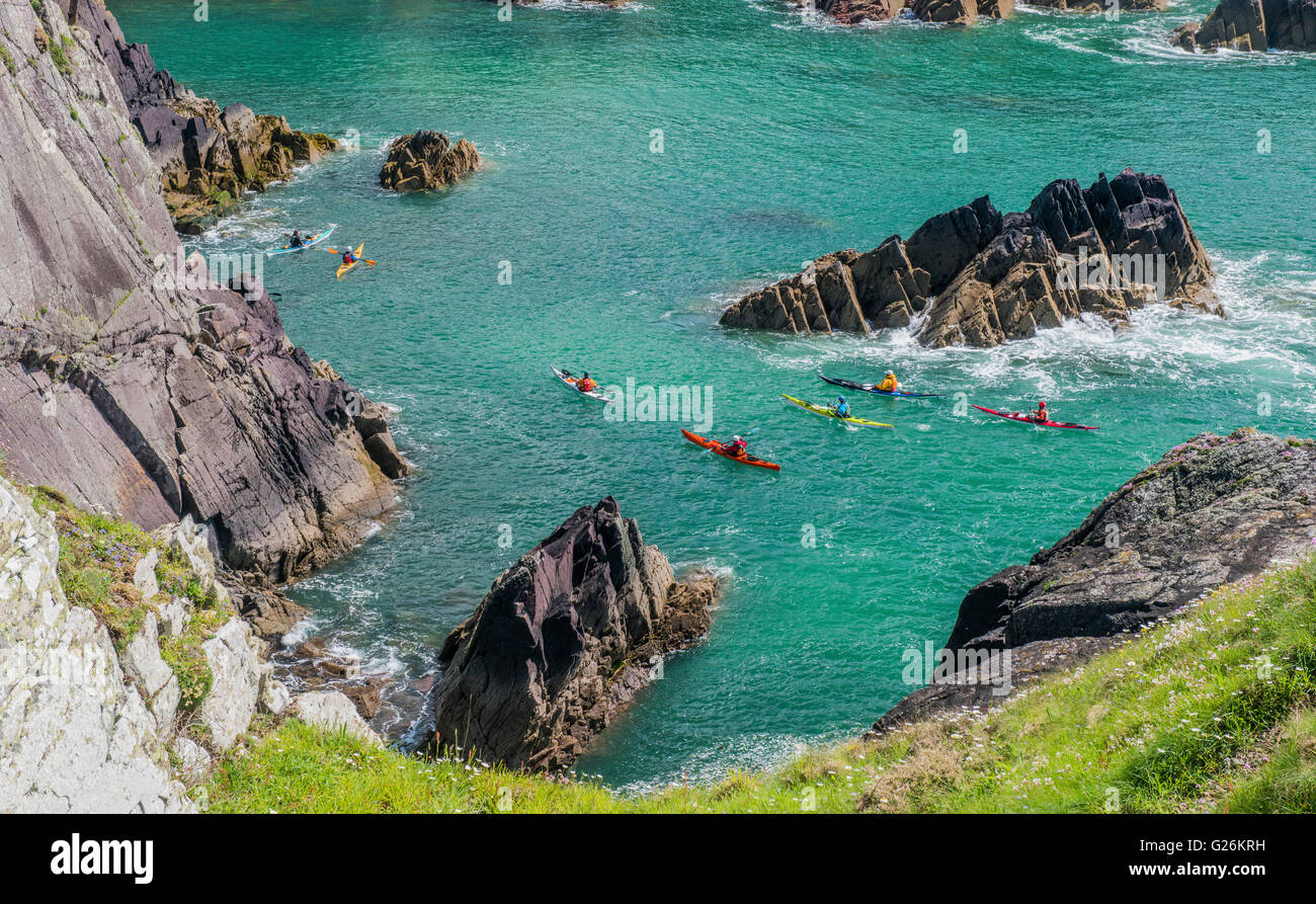 Kayakers off the Pembrokeshire Coast between Porthclais and St Nons in the Wales Year of Adventure Stock Photo