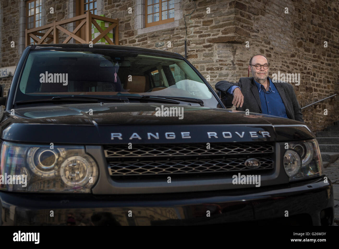 Jean Brouillard, CEO of communication Jean Brouillard, is pictured with his Range Rover in Quebec city on May 4, 2015 Stock Photo