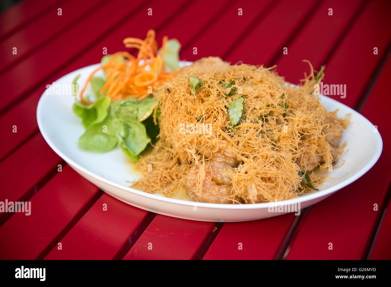 Crispy prawn deep fried in salty egg batter topped with pork floss