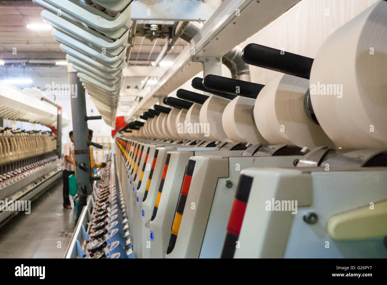 Production heads called spindles textile automatic cone machine winding individual yarn cones