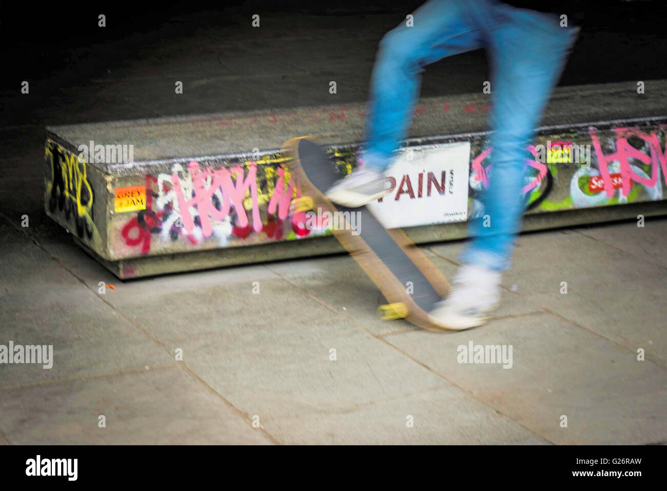 Skateboarding in the skate park with graffiti Stock Photo Alamy