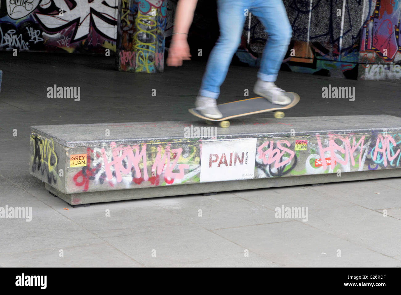 Skateboarding in the skate park with graffiti Stock Photo Alamy
