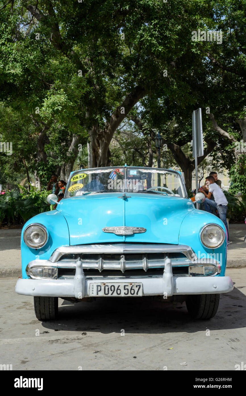 Vintage American car (Chevrolet) in Parque Central, Old Havana, Cuba Stock Photo