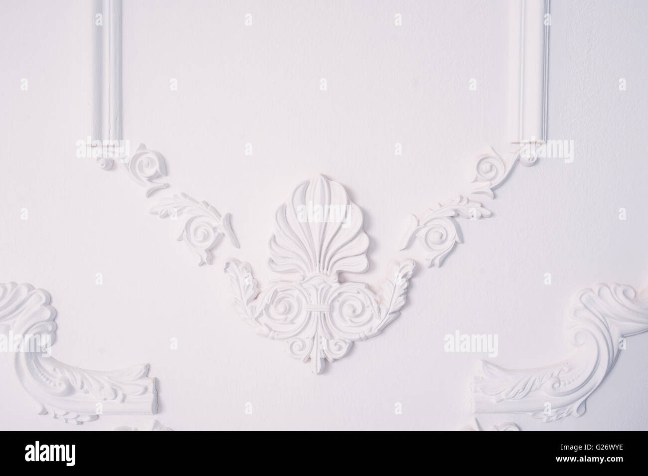 Stucco element of architectural decoration on the wall Stock Photo