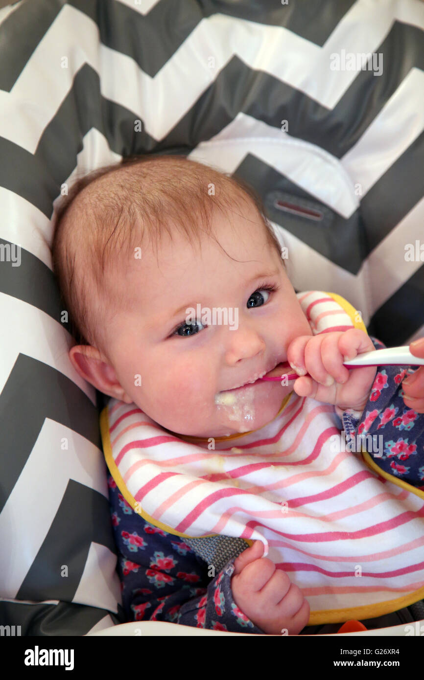 Baby eat porridge hires stock photography and images Alamy