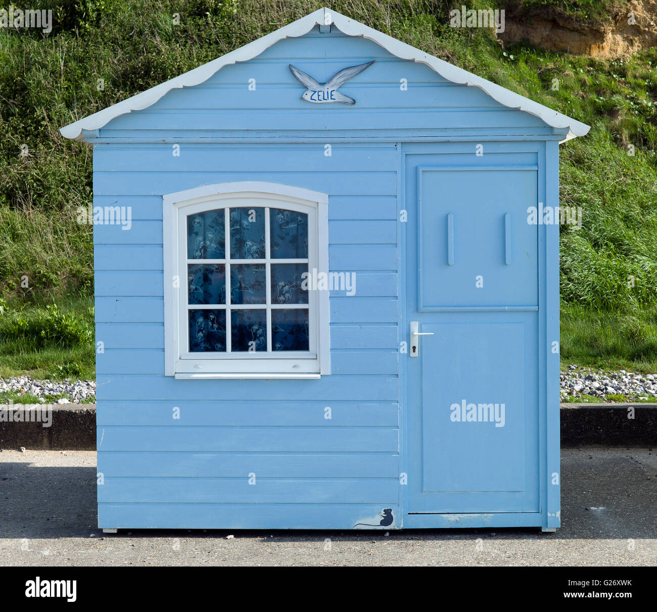 Pretty blue beach hut with curtains, Normandy, France Stock Photo Alamy
