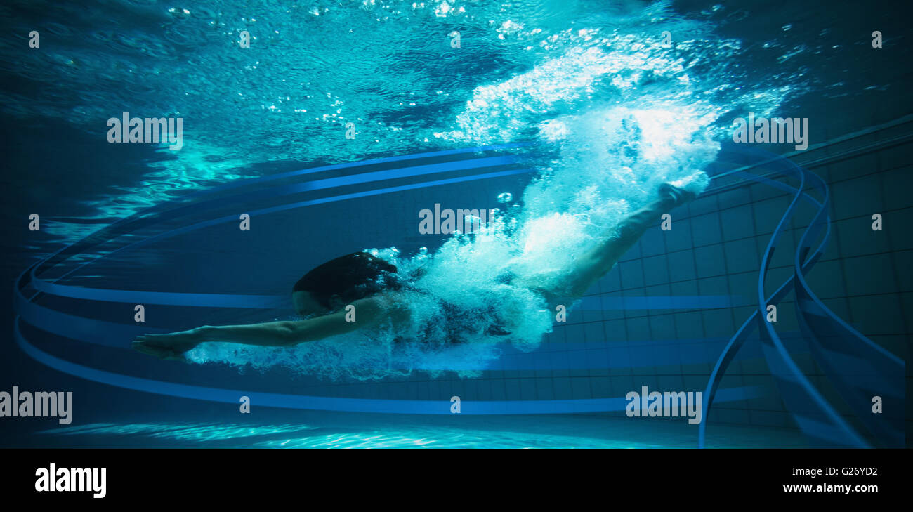 Composite image of athletic swimmer smiling at camera underwater Stock Photo
