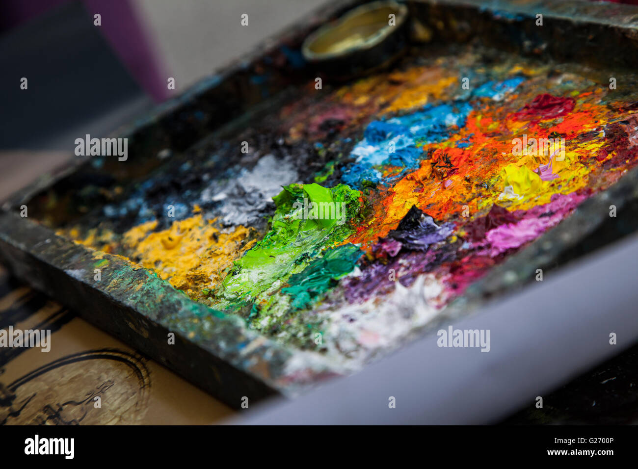 Mixed paint on the palette Stock Photo